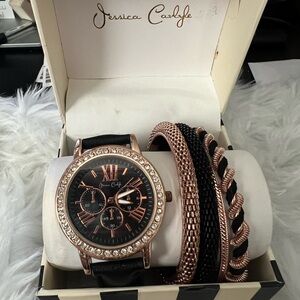 Women’s watch gold and black with 4 bracelets
